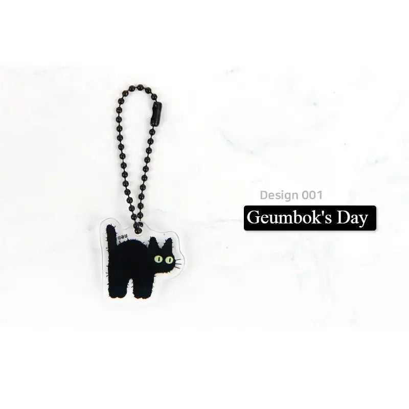 The Tale of Goldiluck, the Black Kitten - Acrylic Charm Keychain - Webtoon Shop - Keychain - Harumio