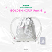 Designed with exclusive GOLDEN HOUR artwork and design elements, this lightweight drawstring bag offers a practical way to carry everyday essentials while showcasing your love for ATEEZ.