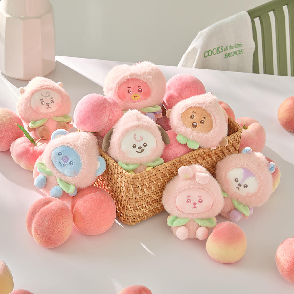 Part of the adorable BT21 Peach Holic collection, this collectible doll keyring features a soft plush design inspired by the sweet peach-themed concept.