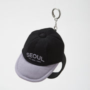 Add a sporty touch to your everyday accessories with the BT21: Travel – Ball Cap Keyring.