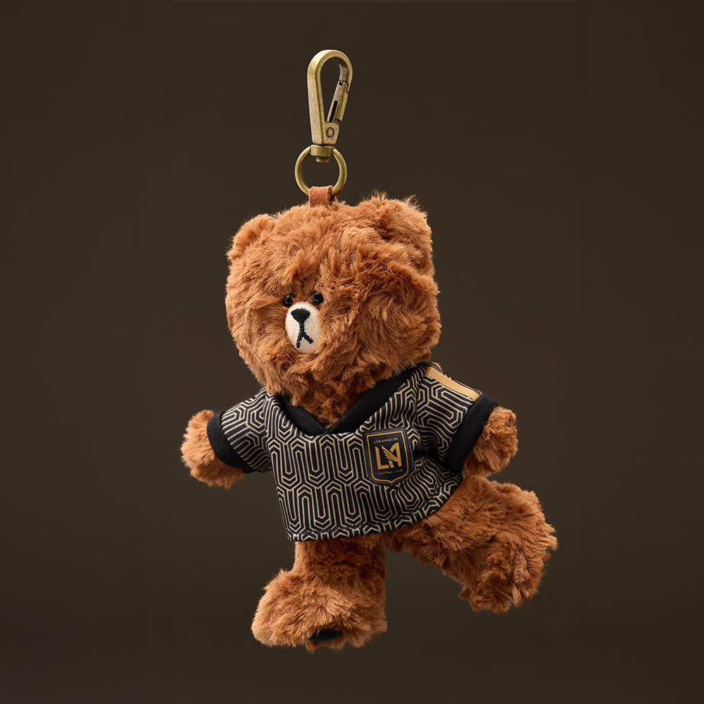 Add a cute and collectible touch to your everyday accessories with the Classic Doll Keyring from the Brown x LAFC collaboration.
