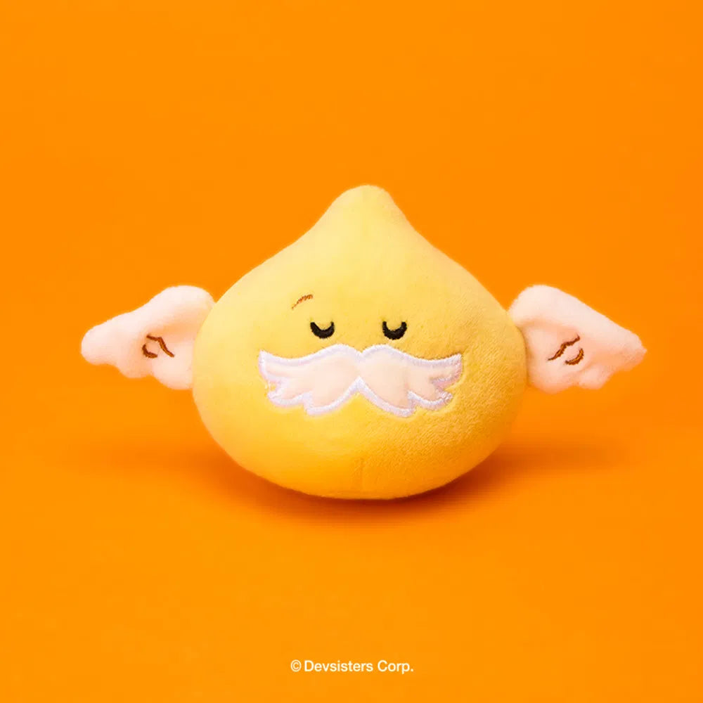 Add a soft and playful collectible to your Cookie Run collection with the Cookie Run - Crumble Golden God Bell Squishy Plush.