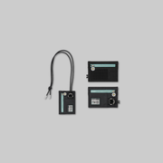Keep your small essentials organized with the official G-DRAGON x FAM POP-UP: G: A BOY'S JOURNEY – Coin Mini Pouch.