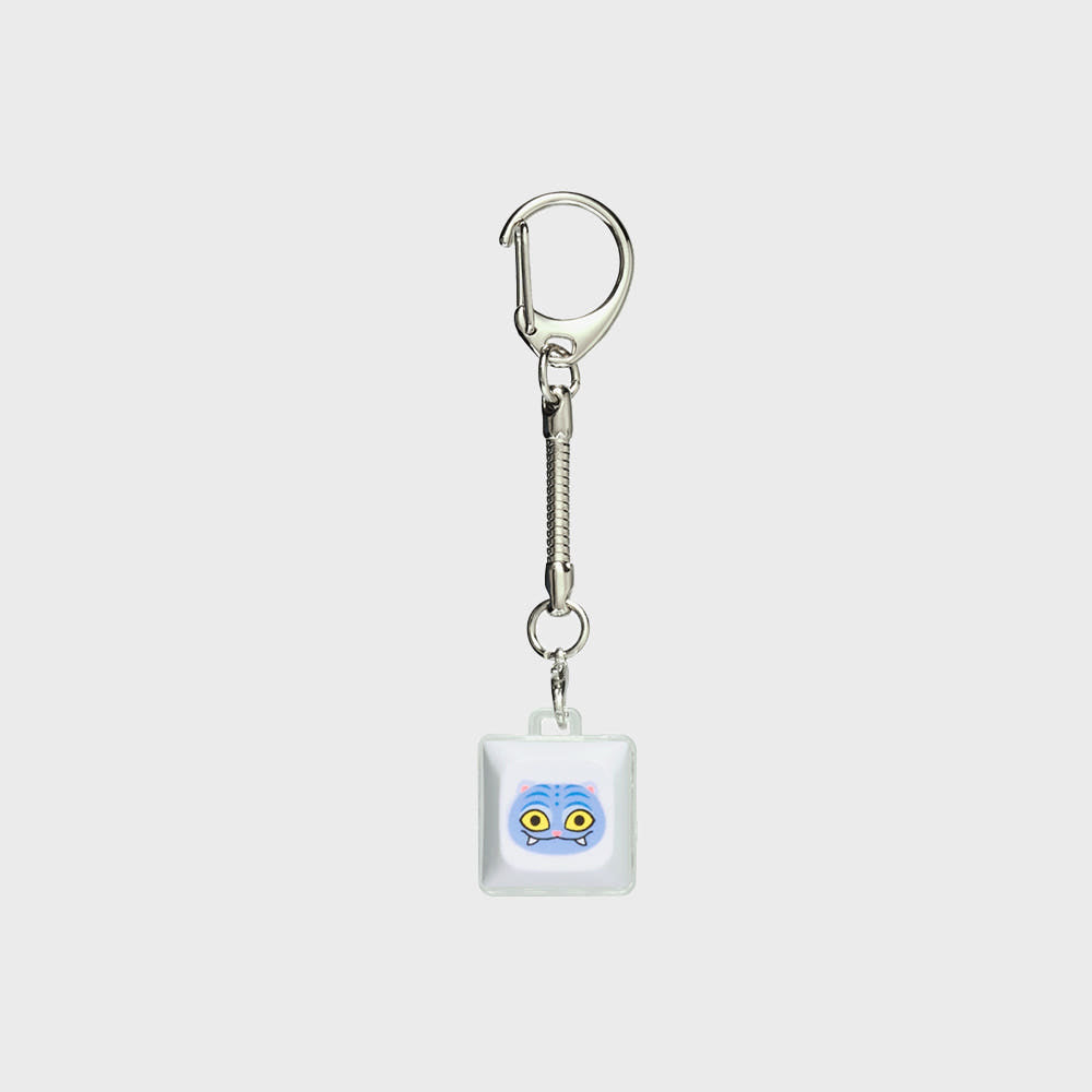 Add a playful touch to your everyday accessories with the official K-pop Demon Hunters – Derpy Keycap Keyring.