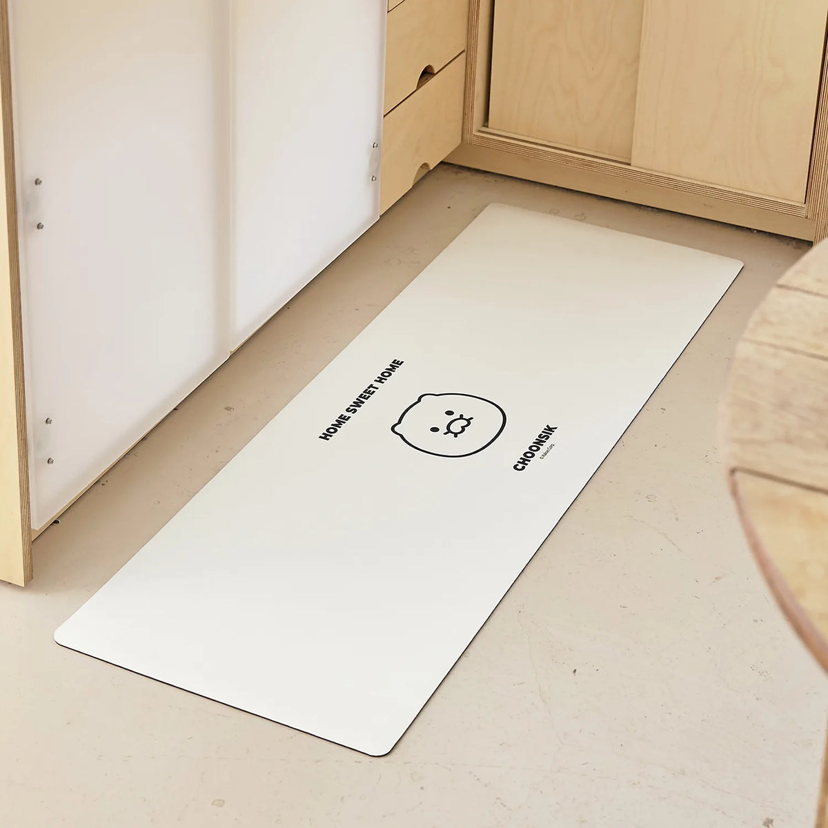 Add a playful touch to your space with the Kakao Friends - Chunsik Earth Mat Square Long.