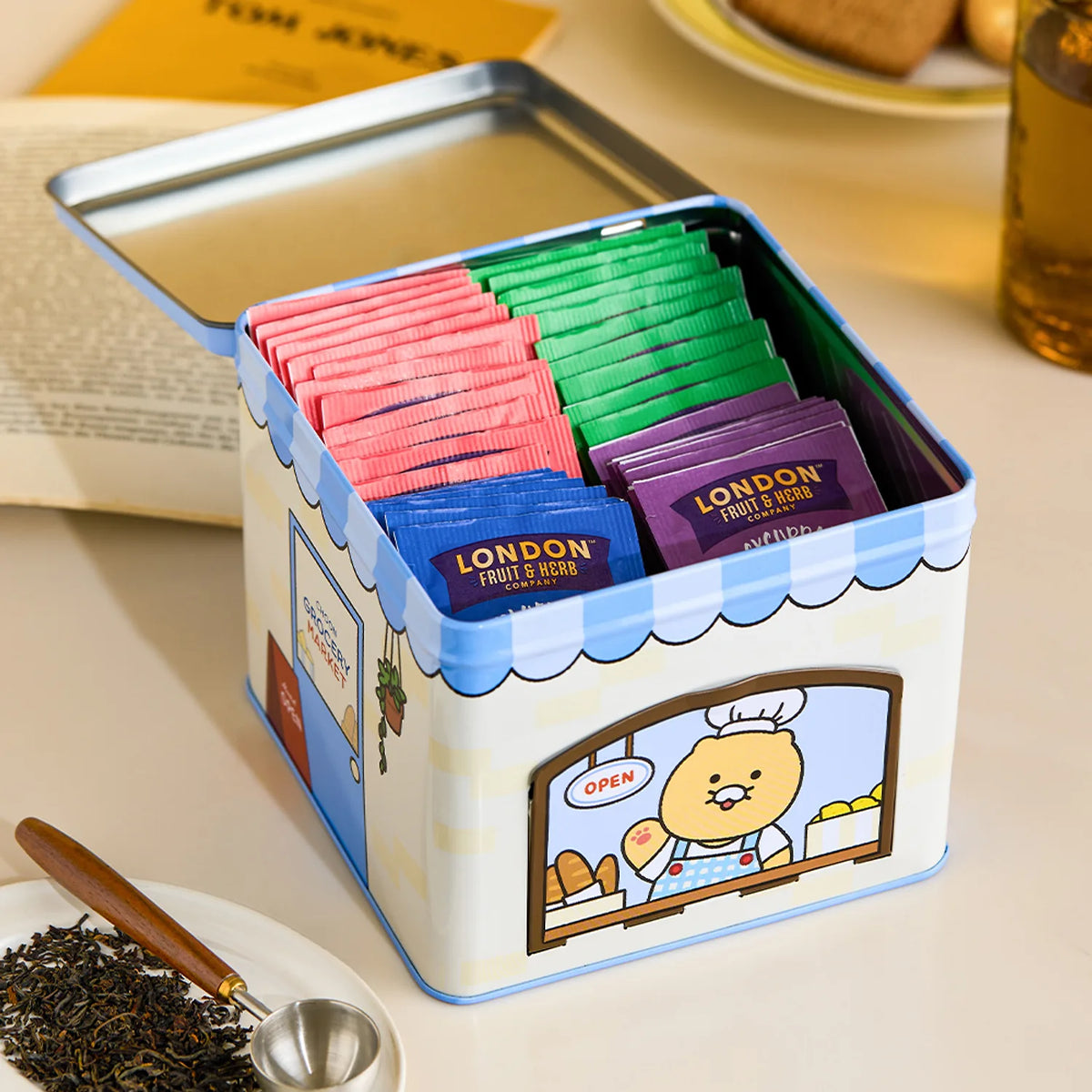 Add a charming touch to your tea collection with the Kakao Friends - Chunsik Grocery Market Drip Tea Bag Tin Case.