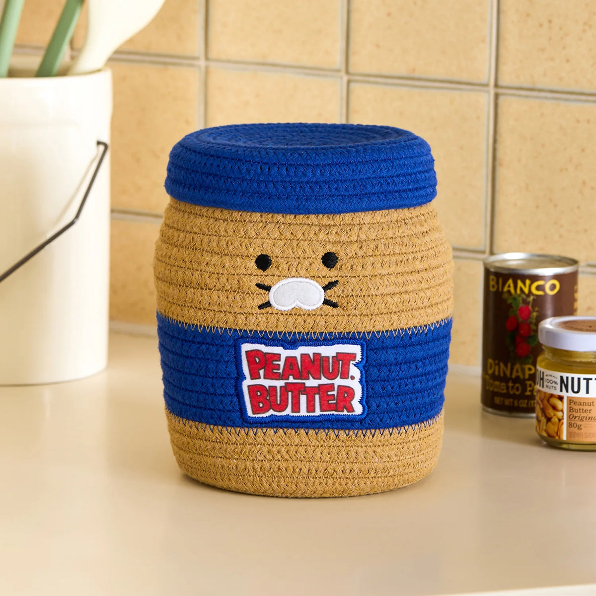 Add a charming touch to your home with the Kakao Friends - Chunsik Grocery Market Honey Jar Rope Basket.