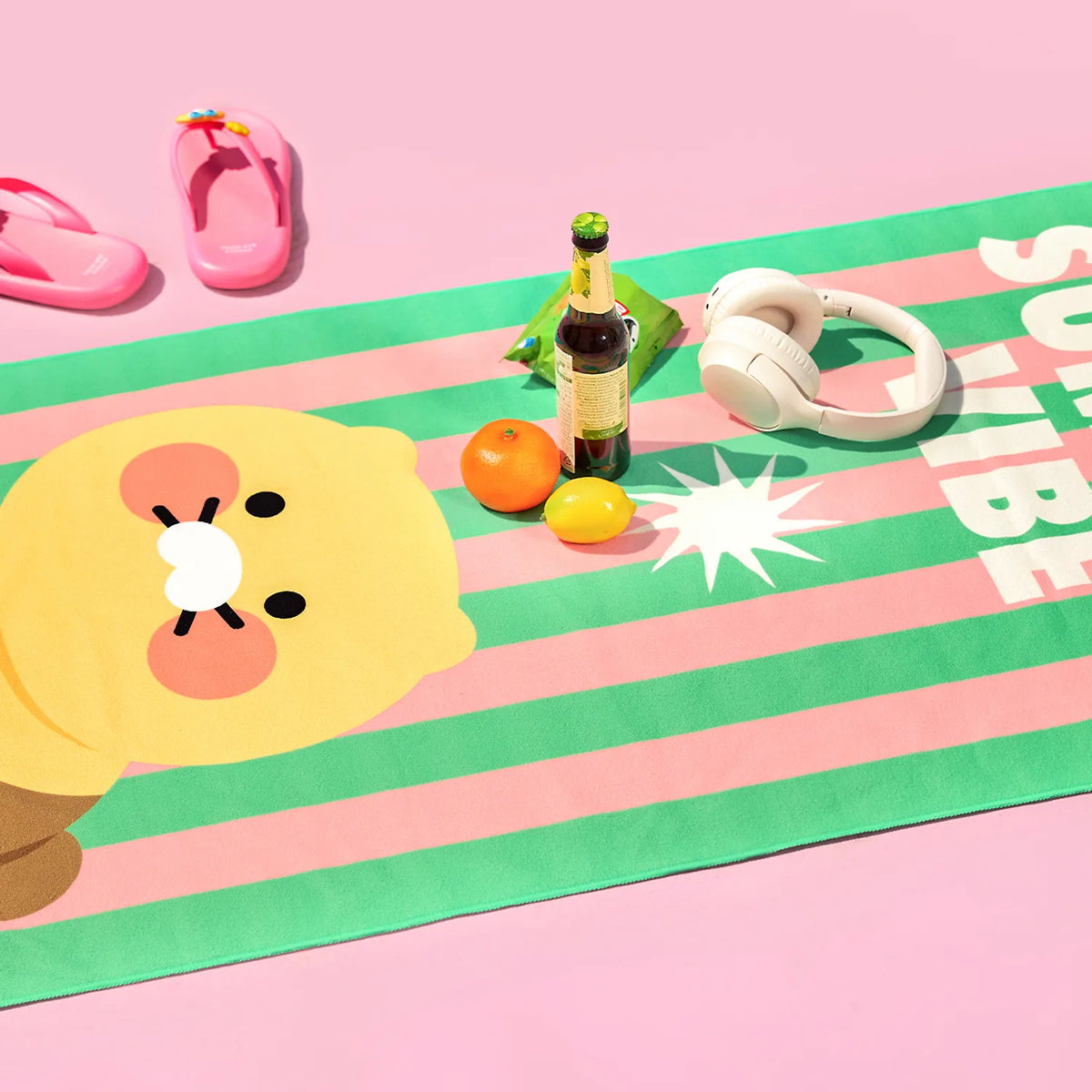 Enjoy sunny days with the Kakao Friends - Chunsik Watermelon Beach Towel, featuring a fun Chunsik-inspired design with a refreshing watermelon theme.