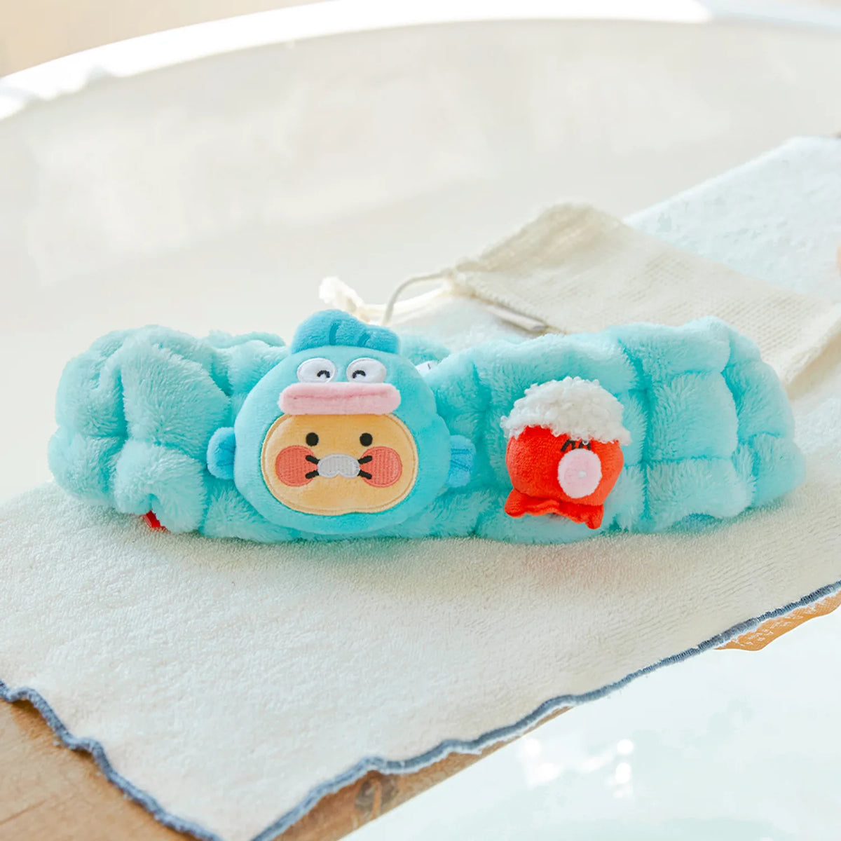 Make your skincare routine extra adorable with the Kakao Friends x Hangyodong - Chunsik Face Wash Headband.