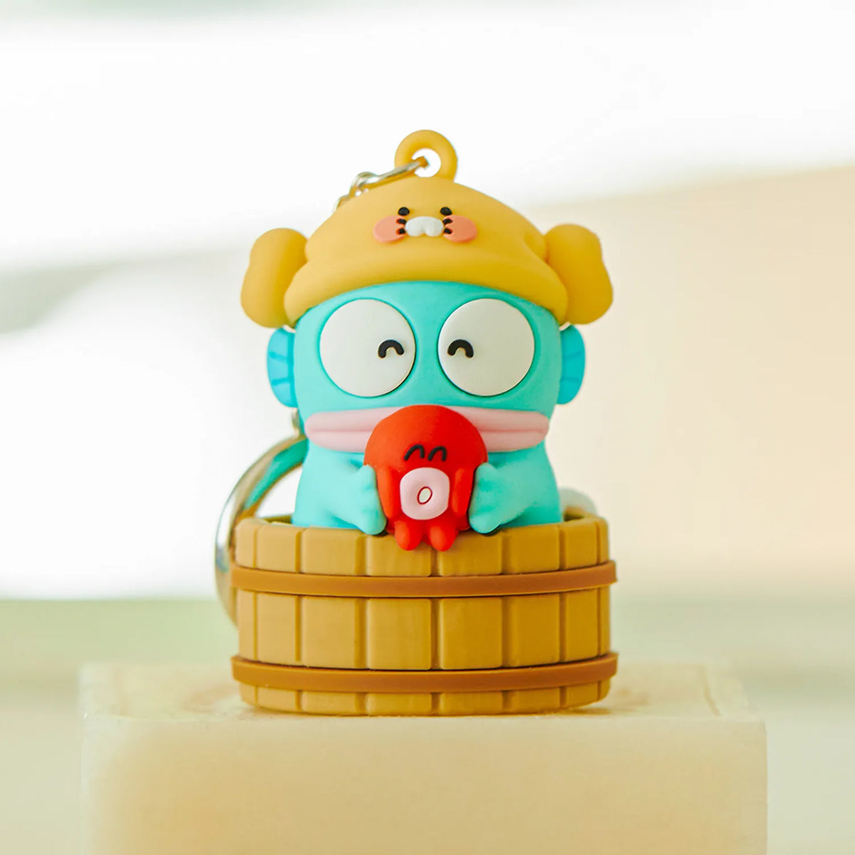 Brighten up your everyday accessories with the Kakao Friends x Hangyodong - Chunsik LED Figure Keyring.
