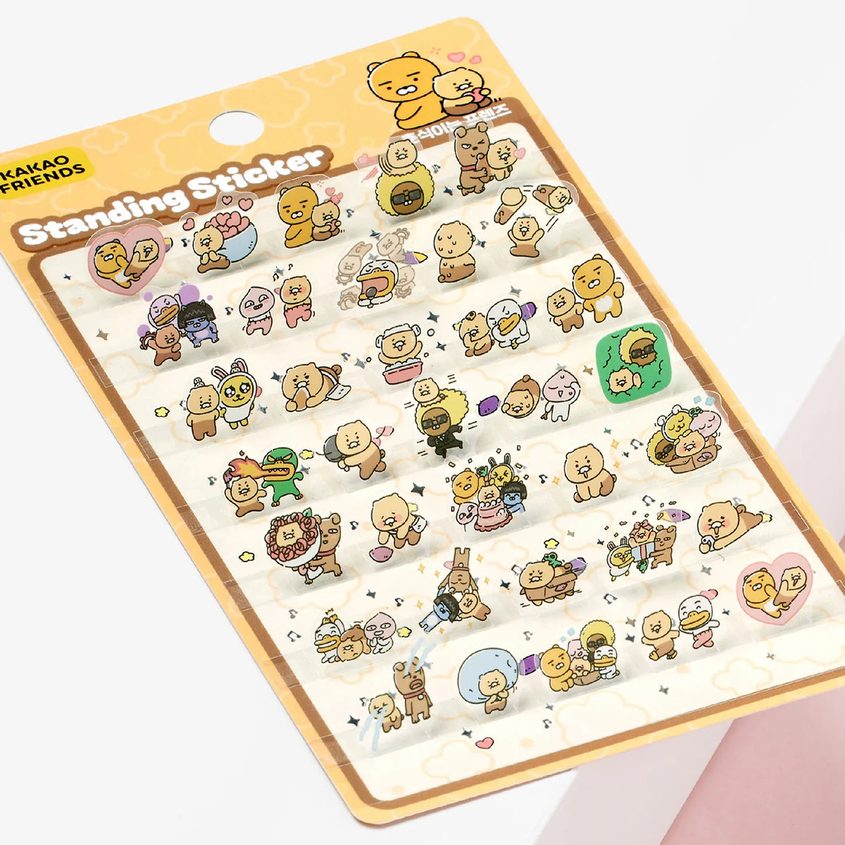 Add a playful touch to your favorite items with the Kakao Friends - Standing Sticker.
