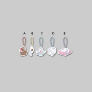 Add a cute and playful touch to your everyday accessories with the Mini Acrylic Keyring from The Black Leopard Family's Snow Leopard Baby: Bloom in the Garden.