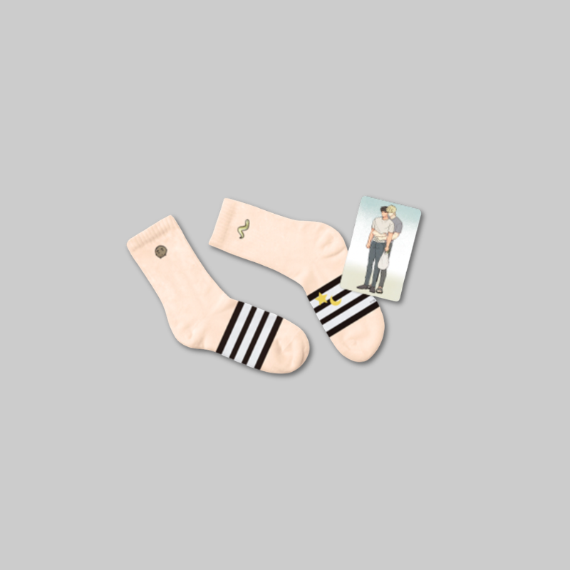 Add a subtle touch of The Sacred Serpent's Seduction to your everyday style with the Socks from the Fantazit collaboration.