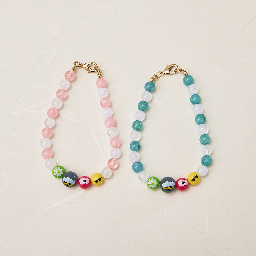 This charming bracelet set features design elements inspired by the Zo &amp; Friends K-Edition collection, making it a fashionable accessory and a delightful collectible for fans.