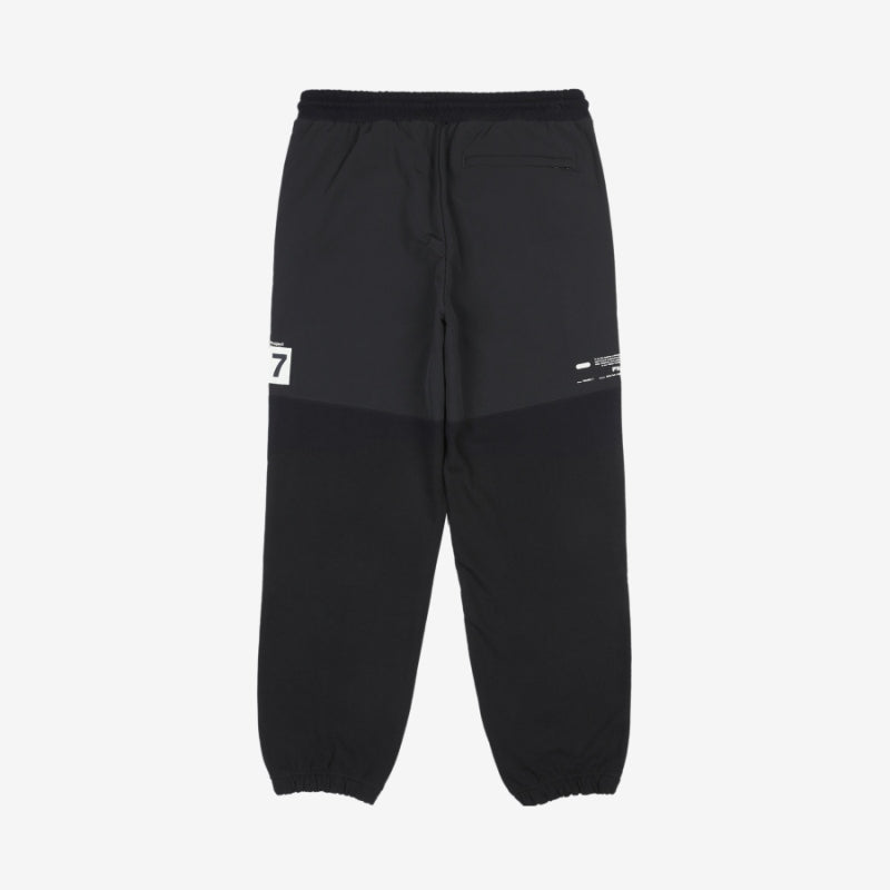 FILA x BTS - Project 7 - Woven Mix Jogger Pants